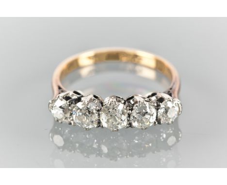 EARLY TWENTIETH CENTURY DIAMOND FIVE STONE RING
the old brilliant cut diamonds totalling approximately 1.10 carats, marked 18