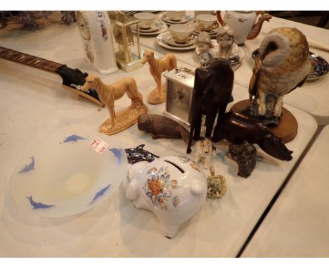 Leonardo owl with further ceramic and carved animal figurines including dolphins 