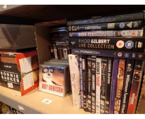 Shelf of CDs and DVDs including box sets of Dinner Ladies Bonnie Barker etc and Philips DVP3120 DVD player 