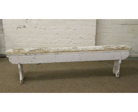 A painted pine spectators bench.