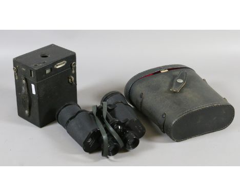 A cased pair of Regent 7x50 binoculars along with a vintage box camera.
