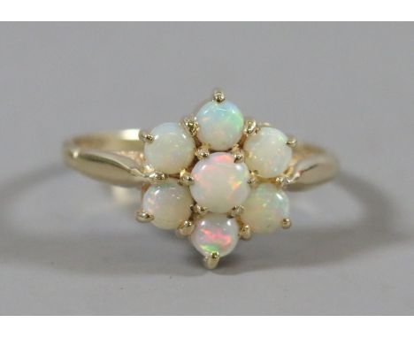 A 9ct gold opal cluster ring size P1/2.