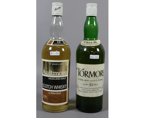 Two bottles of Scotch malt whiskey Tormore 10 year old and Aultmore 12 year old.