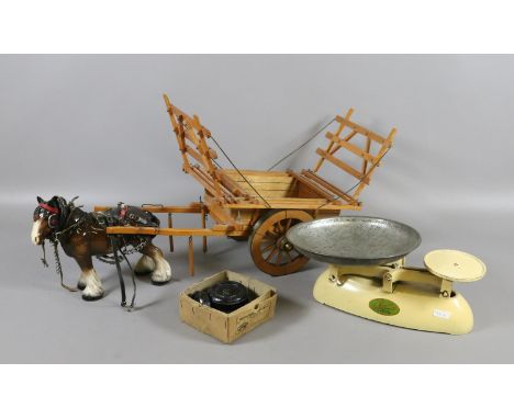 A Melba ware horse and cart along with a pair of Lincoln weighing scales and weights. 