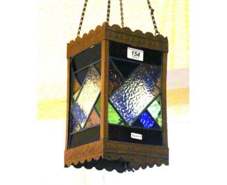 A brass and coloured glass hall lantern.
