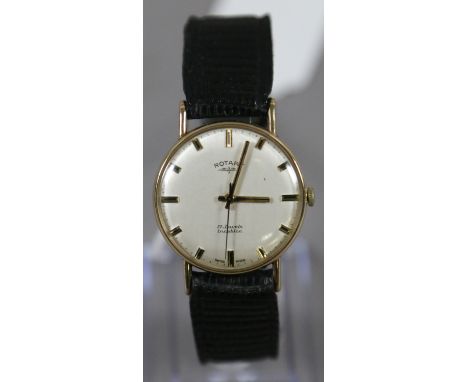 A gentleman's 9ct gold cased manual watch with satin dial baton markers and centre seconds Dennison case, assayed London 1968