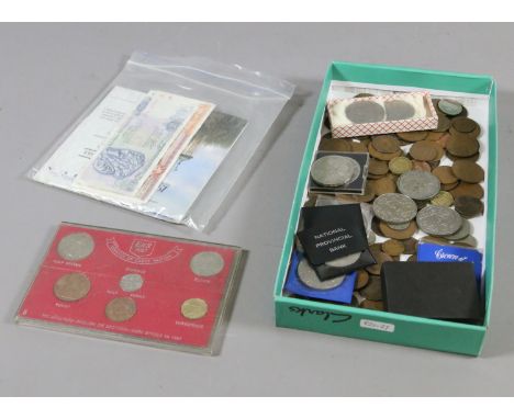 A collection of British coins to include silver and copper examples along with European banknotes.