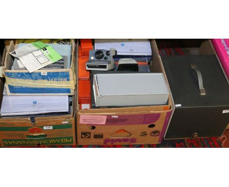 A large collection of viewing slides along with a Boots 300 projector, Paximat Delux viewer, Halina viewer and a Polaroid lan