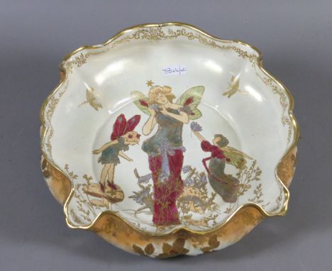 A Crown Devon lustrine bowl decorated with fairies.