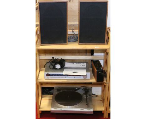 A JVC integrated stereo amplifier with auto return turntable system and speaker along with a Robert radio.