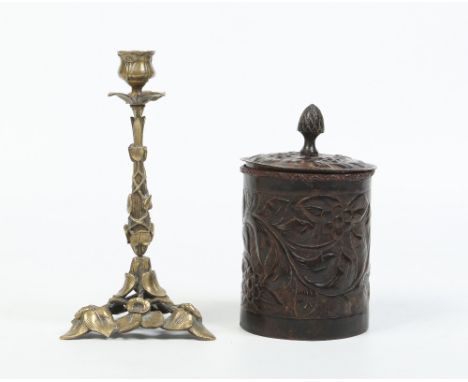 An Art Nouveau gilt bronze candlestick modelled with stylized leaves and an antique European chased copper jar and cover with