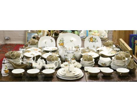 A comprehensive Staffordshire Midwinter part tea/dinner service decorated with oranges and lemons (approximately two hundred 
