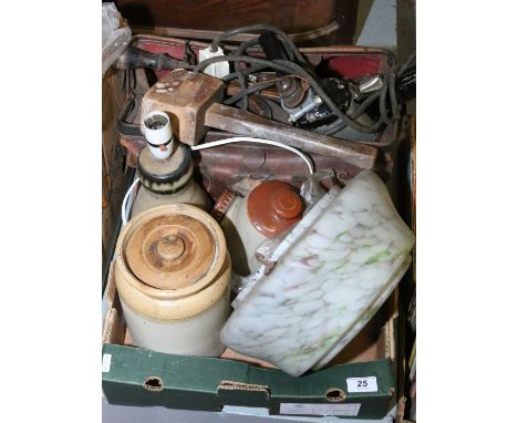 An old leather bag and contents of vintage tools to include block plain, bit and brace electric drill, along with 1950s light