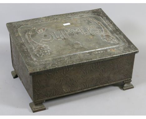 A Victorian metal slipper box raised on bracket feet.