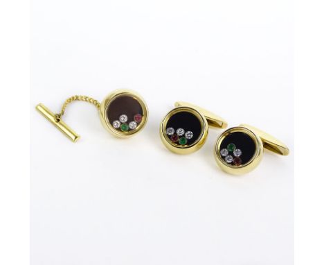 Chopard Man's 18 Karat Yellow Gold, Diamond, Ruby and Emerald Happy Cufflinks and Tie Tack Set. Signed Chopard, 750, Happy Di