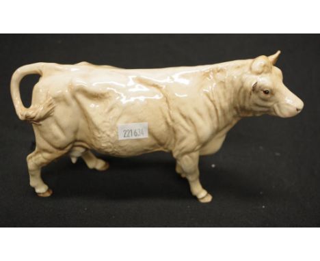 Beswick 'Brown Cow' figure standing figure, marked to hoof, (height 11cm; length 20cm approx).