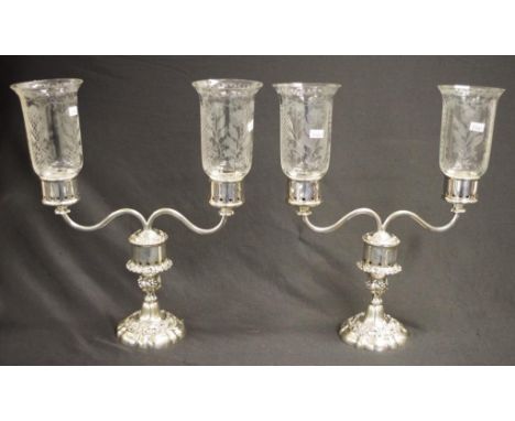 Pair of two branch storm lanterns with silver plate bases and etched glass lantern shades, height 38.5cm approx