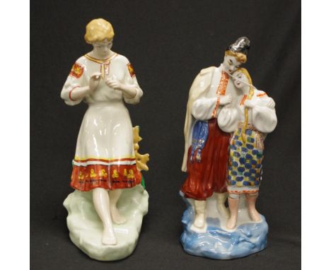 Two various Continental ceramic figures possibly of Hungarian origin, including: standing couple in national dress, (height 2