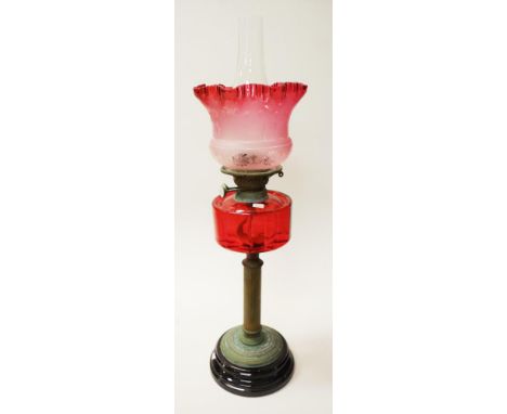 Antique kerosene banquet lamp with ruby glass reservoir and shade, brass column on a glass base, with duplex burner, height 7
