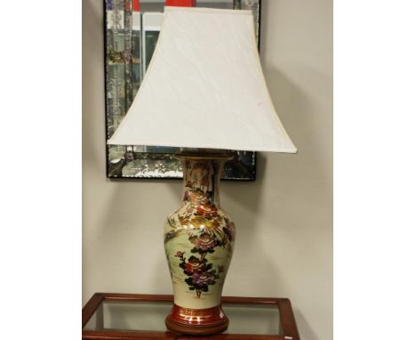 Japanese Satsuma electric lamp with bird and floral decoration on a timber base, together with a cream lamp shade, height 86c