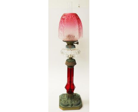 Antique ruby glass decorated banquet lamp tall ruby glass column, supporting cut crystal fuel  reservoir, to dual burner, and