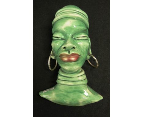 Decorative ceramic African Woman wall decoration (height 18cm approx).