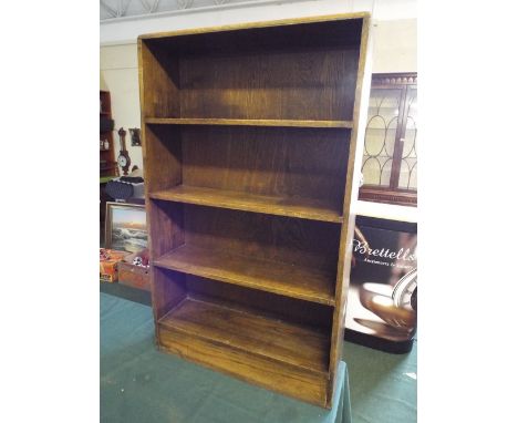An Oak Four Shelf Open Bookcase.