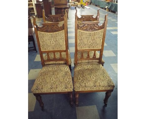 A Set of Four Late Victorian Oak Dining Chairs with Tapestry Seats and Backs. 