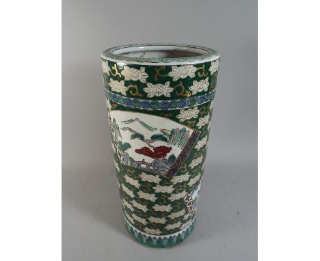 An Oriental Ceramic Stick Stand Decorated in Multi Coloured Enamels.