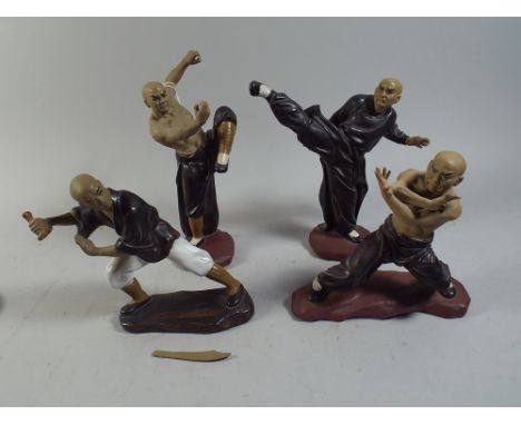 A Set of Four Japanese Martial Art Figures. 