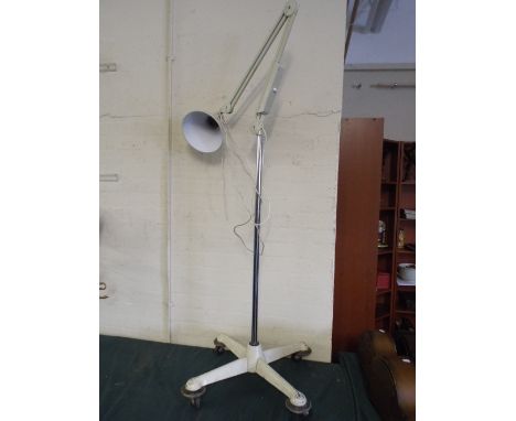 A 1950's Angle Poise Reading Lamp on Weighted Trolley Stand by Thousand and One Lamps Limited London. 