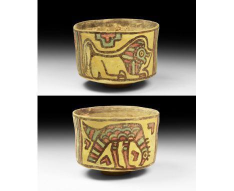 3rd millennium BC. A ceramic cup decorated with panels of polychrome pigment with a reclining lion to one side and a vulture 
