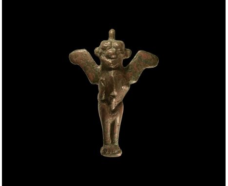 10th-6th century BC. A substantial pendant of Pazuzu with pierced lug above the head; the figure with the body of a man, the 