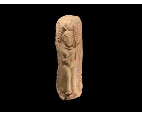 8th-6th century BC. A rectangular ceramic plaque with a high-relief standing nude female, wearing a prominent necklace and he