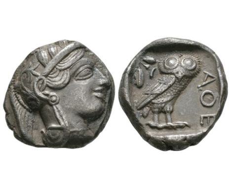 454-404 BC. Obv: helmeted head of Athena right with frontal eye. Rev: AQE with owl standing right, head facing, olive twig wi