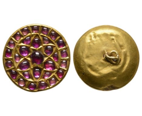 16th-17th century AD. A hollow-formed gold discoid plaque with outer ring of rectangular cells each set with a cabochon ruby,