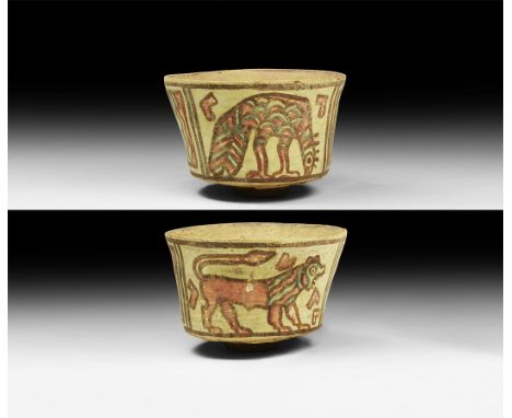 3rd millennium BC. A ceramic Nal culture cup decorated with polychrome panels depicting a standing vulture and a roaring lion