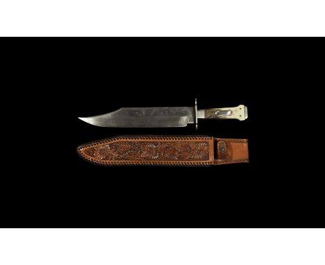 20th century AD. A knife comprising a double-edged steel blade with clipped point and ricasso, transverse bolster, handle wit
