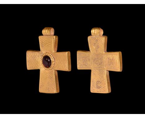 18th-19th century AD. A hollow-formed gold cross pendant in Byzantine style, with integral ribbed loop, incised chevrons to t