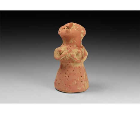 3rd-2nd millennium BC. A ceramic figure of a female with head tilted up, prominent brow ridge and nose with applied eyes and 