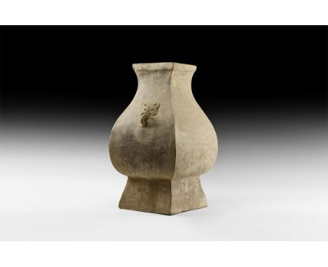 Han Dynasty, 206-220 AD. A large ceramic square section Fang Hu wine vessel, square foot supporting a bulging rounded body wi