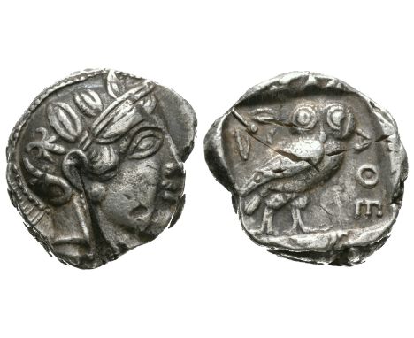 Copying type circa 415 BC. Obv: helmeted head of Athena right, eye seen in full, palmette on bowl of helmet, double loop befo
