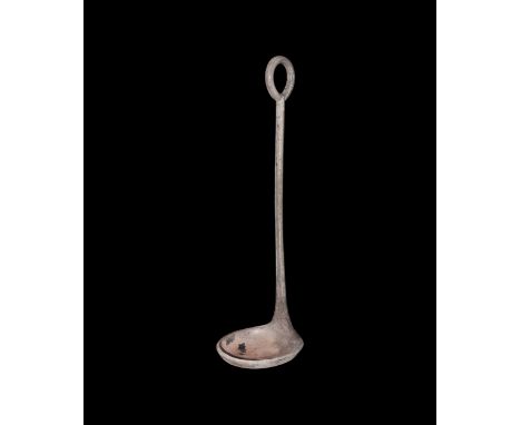 19th century AD or earlier. A silver ladle with octagonal-section shank, suspension loop finial, flat-bottomed bowl with lip.