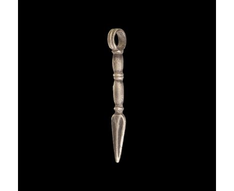 9th-11th century AD. A silver pendant of a spear with balustered shaft, midrib to the leaf-shaped blade, ribbed loop. 4.74 gr