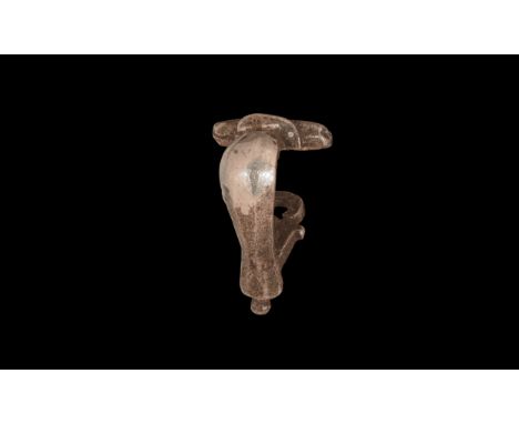 2nd century AD. A silver knee brooch with facetted bow, catch to the reverse. Cf. Hattatt, R. Iron Age and Roman Brooches, Ox