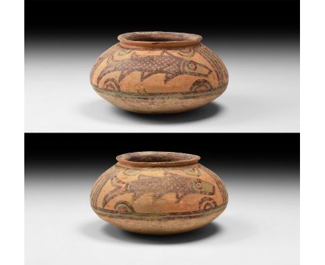 3rd millennium BC. A ceramic Nal culture pot with polychrome pigment decoration of fish either side of two panels with vertic