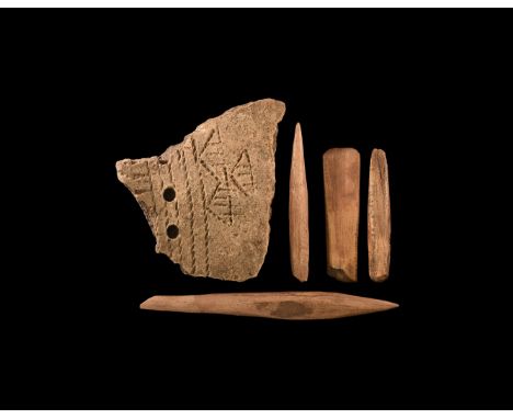 Neolithic, 4th-3rd millennium BC. A mixed group of bone tools comprising: two awls and two points; a sherd of pottery decorat