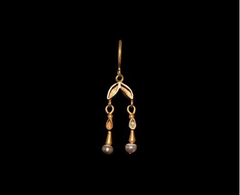 8th-10th century AD. A gold hoop earring with loop and granule, two leaf-shaped cells with dangles, each a piriform cell, one