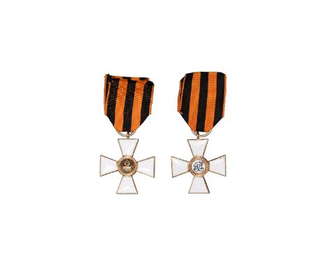 19th century AD. With suspension loop and ribbon. Obv: cross with white enamel to arms; central roundel with black/red enamel