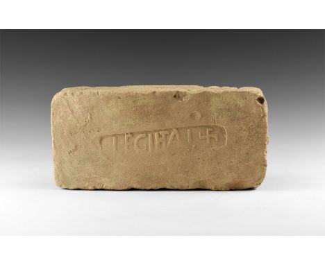 1st-3rd century AD. A ceramic rectangular brick of coarse buff clay, stamped to the upper surface with 'LEGI ITAL' and a swas